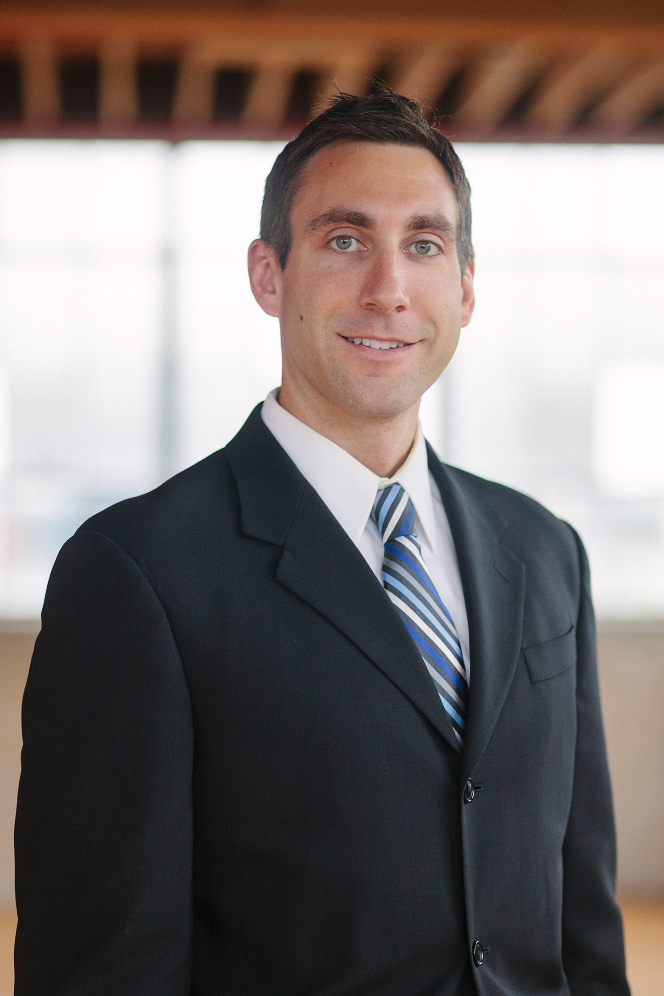 Tyler Addington, RE/MAX of Grand Rapids logo
